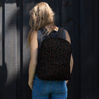 Daemon Luxury Speckled Diamonds NEMESIS backpack with all-over white print, featuring a stylish and modern design.