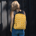 White all-over-print backpack featuring frosted diamond and Tarmin Honeybees design by Daemon Luxury.