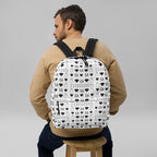 White all-over-print backpack featuring Dim Diamonds Artica Blizzard design by Daemon Luxury, with sleek front view.