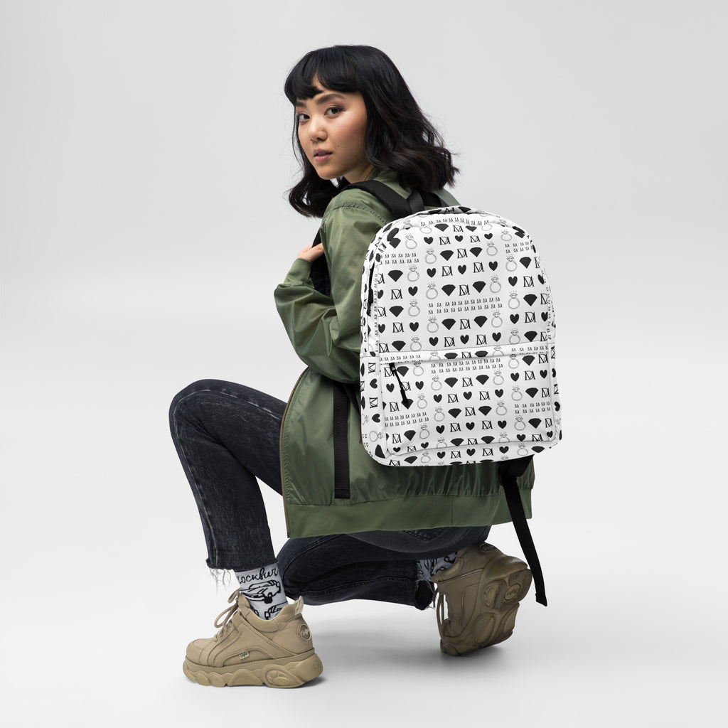 All-over print white backpack featuring Dim Diamonds Artica Blizzard design by Daemon Luxury, showcasing a stylish, modern accessory.