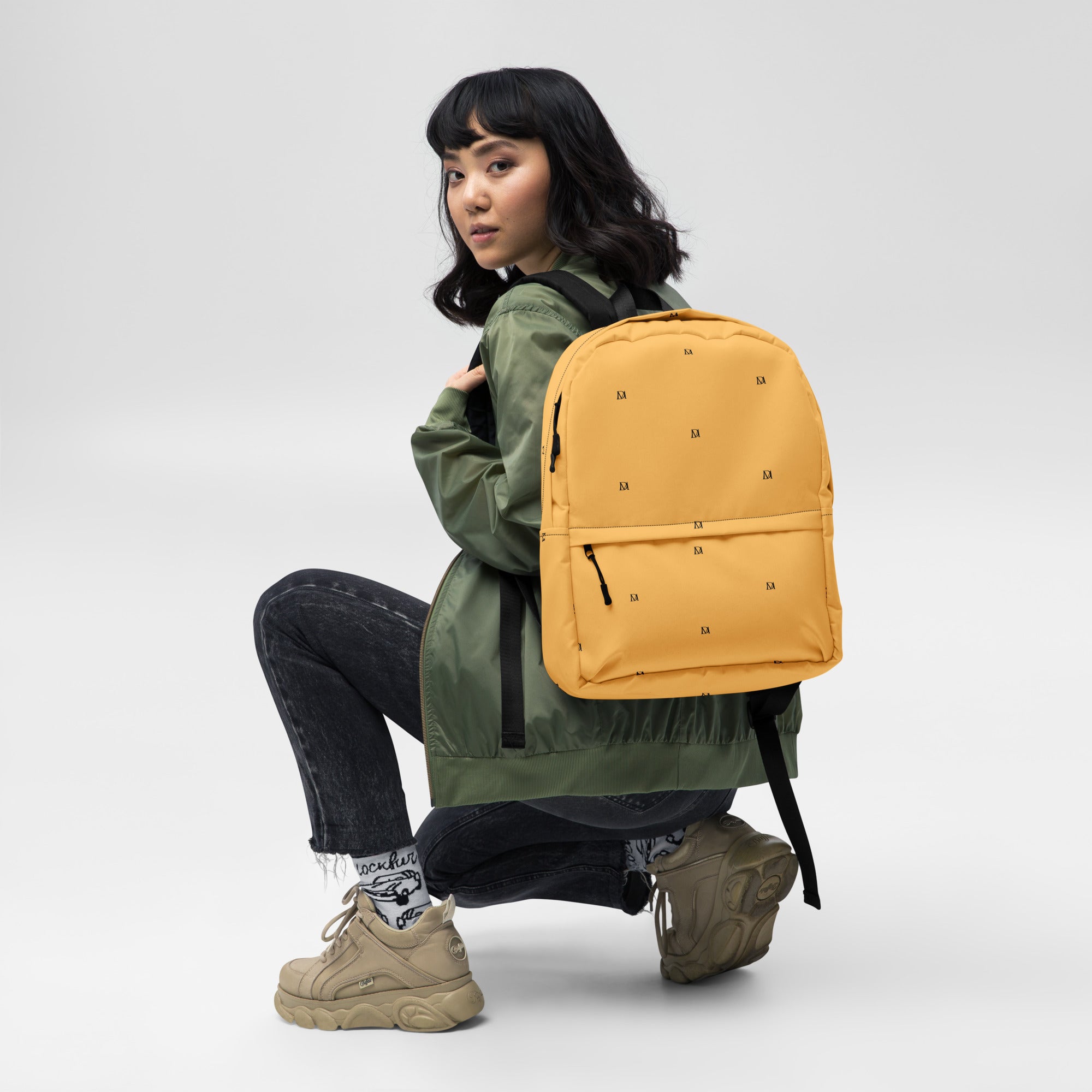 Daemon Luxury Stargaze Minno backpack with all-over white print and adjustable straps, designed for stylish everyday use.