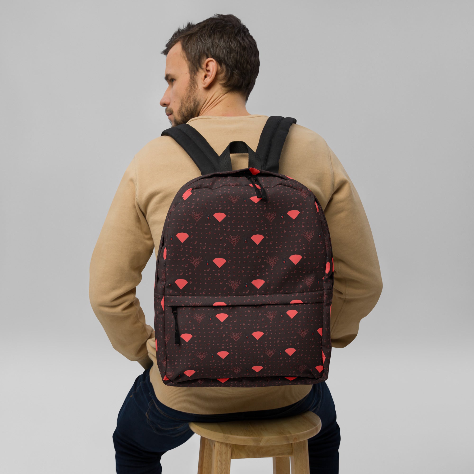 Daemon Luxury Supreme Models WEBBI DAIMIN all-over-print white backpack with sleek design and front zipper pocket.