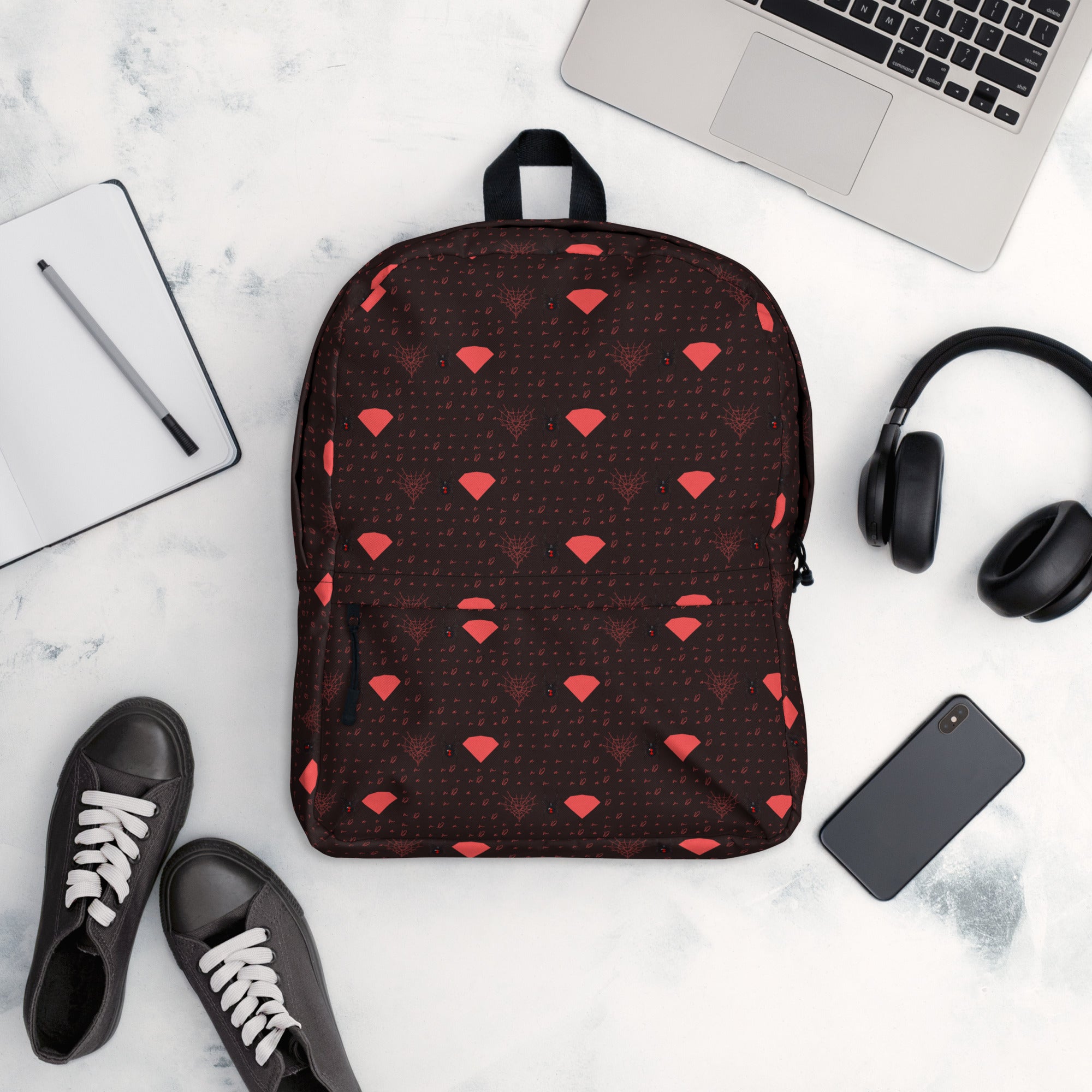 Daemon Luxury Supreme Models WEBBI DAIMIN all-over-print backpack in white, featuring bold design on the front.