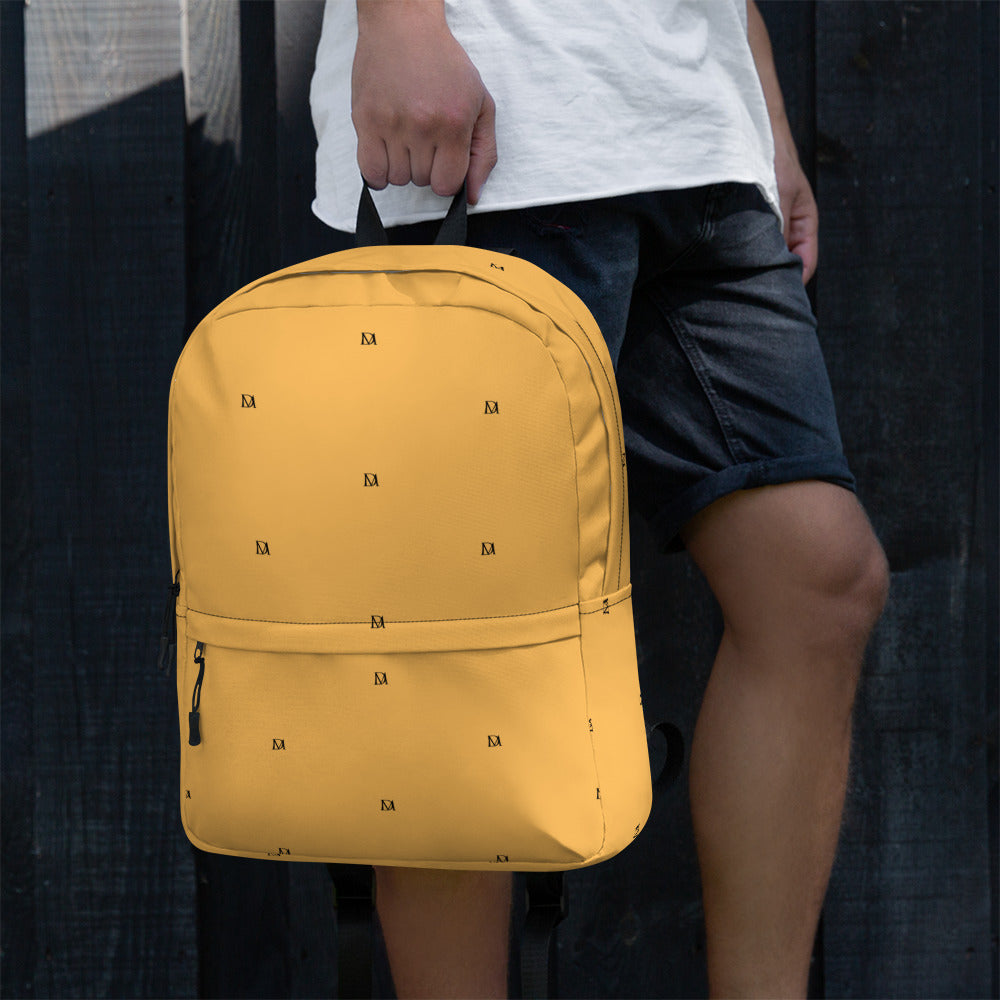 White Stargaze Minno backpack by Daemon Luxury with an all-over star and moon print, shown from the back facing left.
