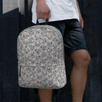 Heartfelt STF all-over-print backpack by Daemon Luxury featuring a white design and adjustable straps.
