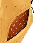 White Stargaze Minno backpack by Daemon Luxury with all-over star and moon print, showing the back and shoulder straps.