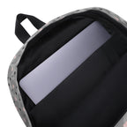 White Heartfelt STF backpack with all-over-print design by Daemon Luxury, featuring a stylish and spacious zippered main compartment.