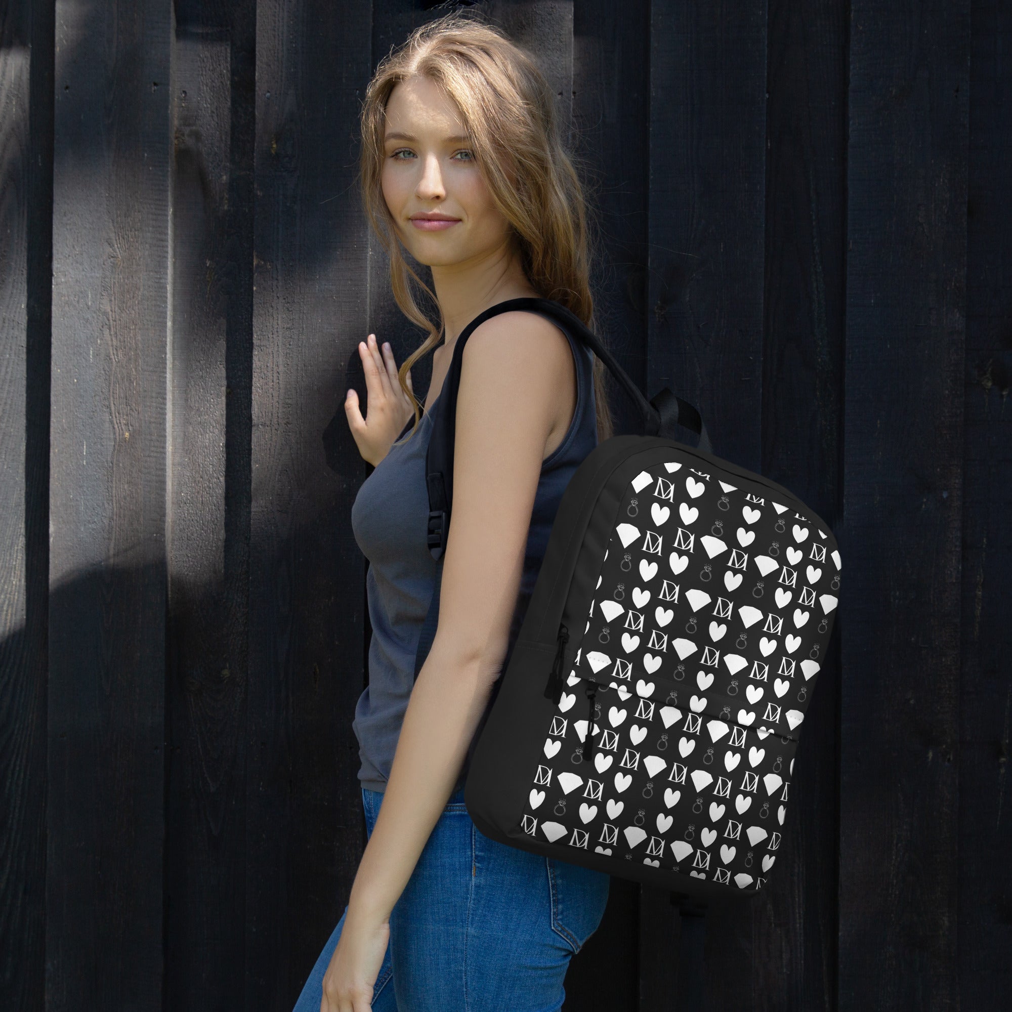 White Daemon Luxury Frosted Diamonds backpack with an all-over print, featuring a stylish and modern design for everyday use.