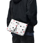 Daemon Luxury Metronome Paris crossbody bag with all-over black print, featuring a stylish and compact design.