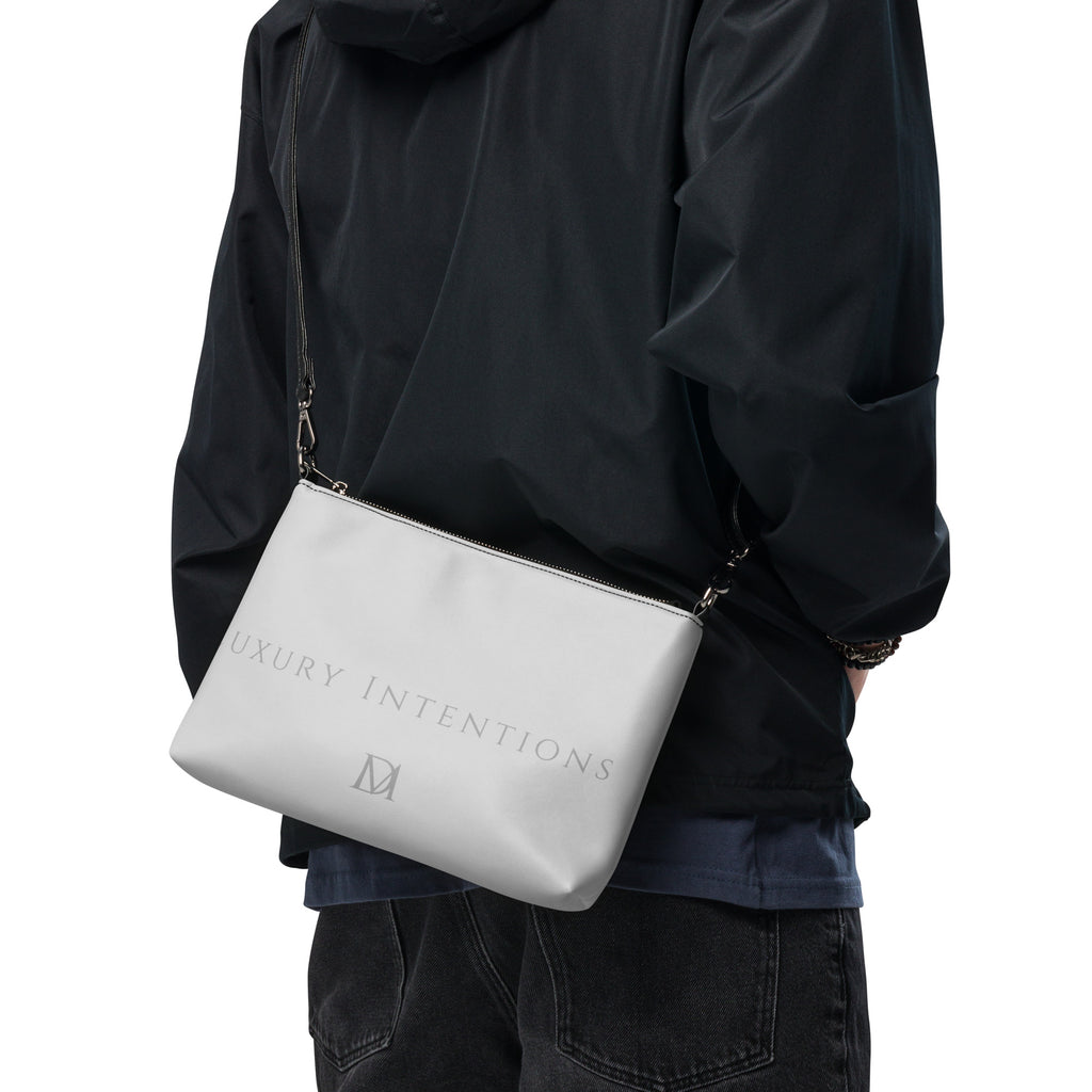 Black NARDO Scale Sunless Dream crossbody bag by Daemon Luxury with all-over print and adjustable strap.