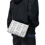 Daemon Luxury Dim Diamonds Artica Blizzard Borsone crossbody bag with all-over black and white diamond pattern, back view.