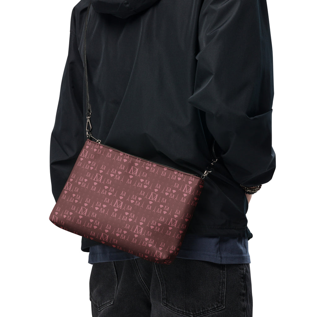 All-over black print crossbody bag from Daemon Luxury's Dim Horizon Borsetta collection with adjustable strap and sleek design.