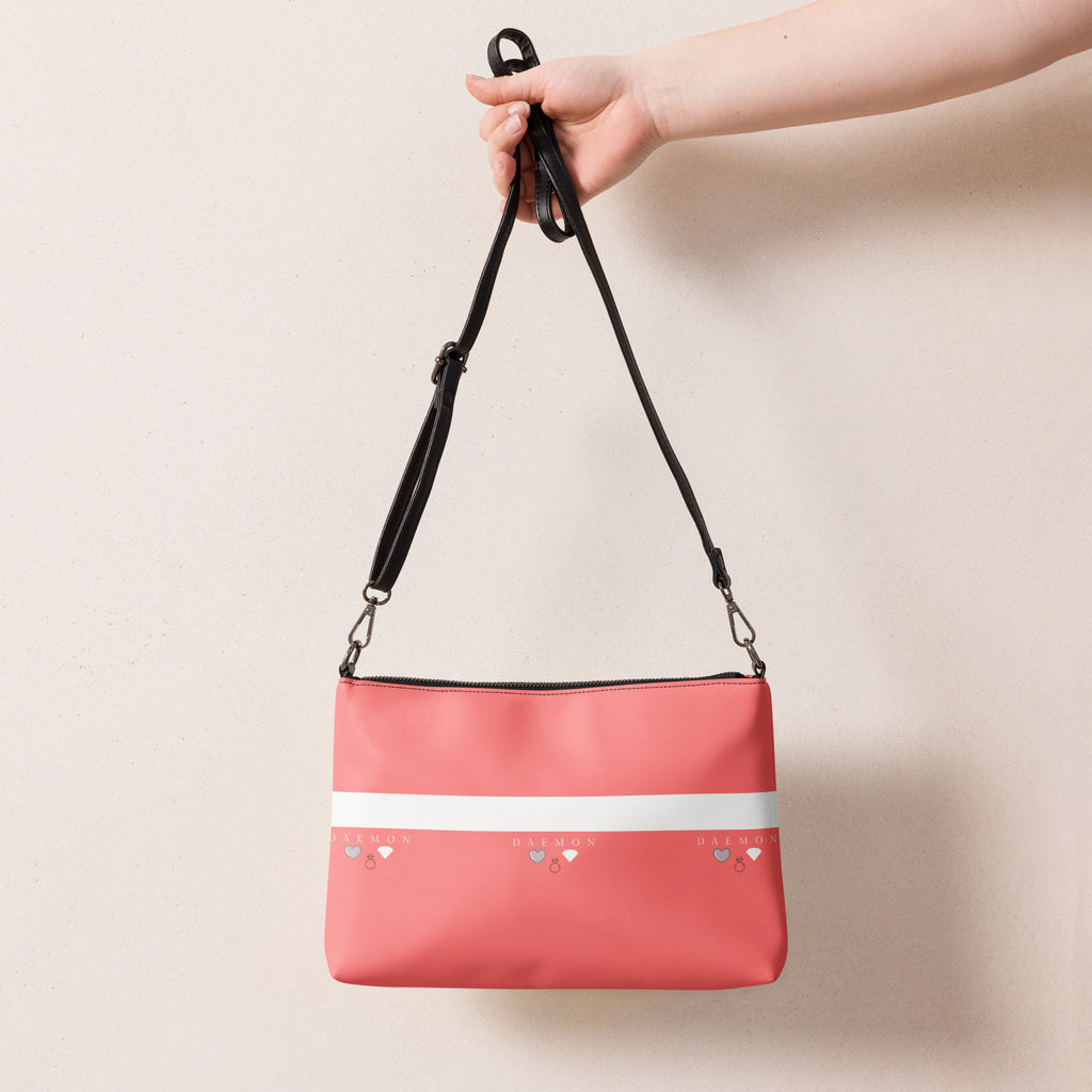 Daemon Luxury SACHI BANS white label crossbody bag with all-over black print, featuring a sleek, compact design and adjustable strap.