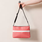 Daemon Luxury SACHI BANS white label crossbody bag with all-over black print, featuring a sleek, compact design and adjustable strap.