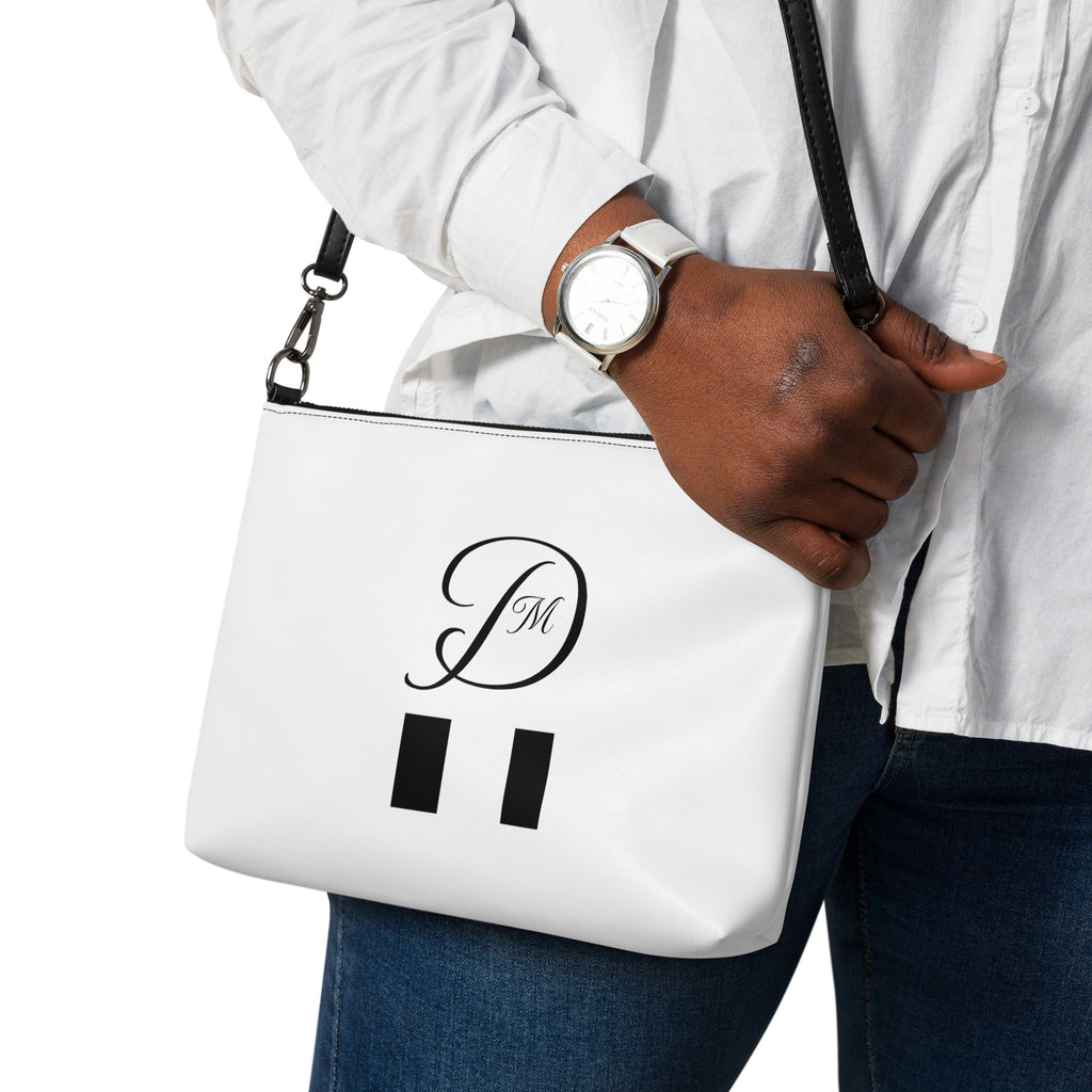 Daemon Luxury Metronome Paris Borsetta crossbody bag with all-over black print, showcasing stylish design and compact size.