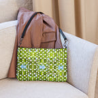 Daemon Luxury Belly Red’s Garden (Rebirth) crossbody bag with all-over black and colorful floral print, featuring a compact design.