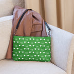 Daemon Luxury Belly Red’s Garden Borsetta crossbody bag with all-over floral print on black fabric.