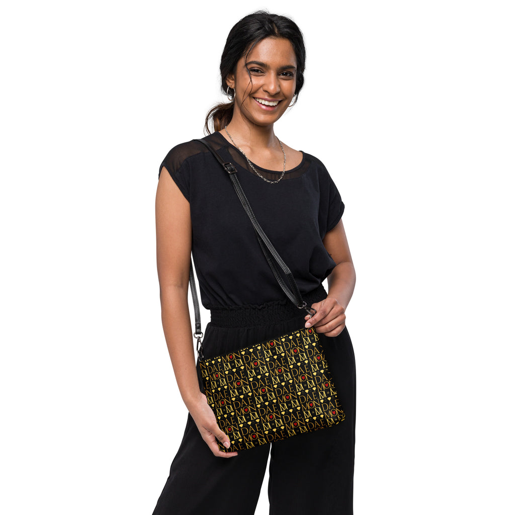 Daemon Luxury Sun Glow California Borsetta crossbody bag with all-over black print and adjustable strap, stylish and compact accessory.