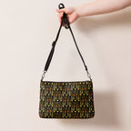 Daemon Luxury Sun Glow California Borsetta crossbody bag with all-over print in black, featuring stylish design and adjustable strap.