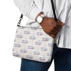 Honeybee Intel forecast crossbody bag by Daemon Luxury with all-over black print and adjustable strap.