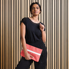 Black Daemon Luxury SACHI BANS crossbody bag with all-over white label print and sleek front design.