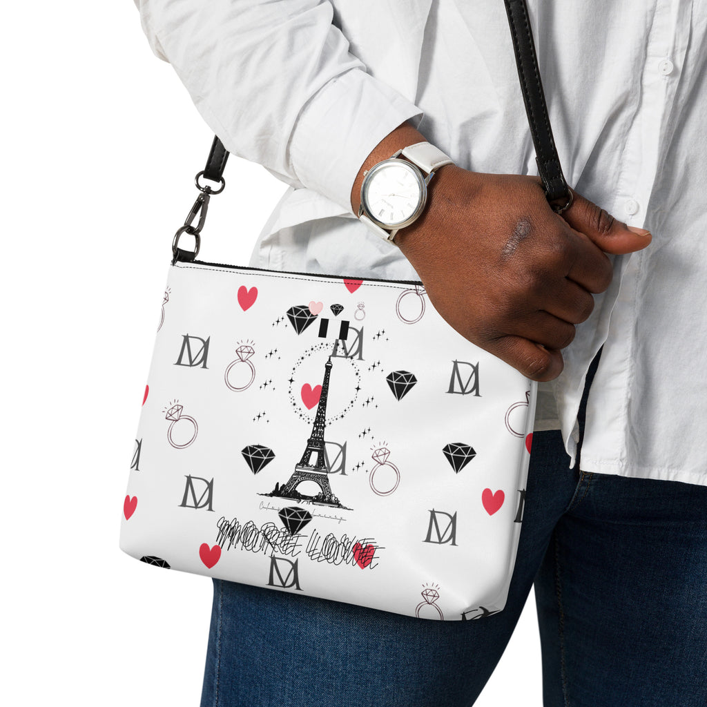 Daemon Luxury Metronome Paris Borsetta crossbody bag with all-over print, black leather with detailed design on the front.