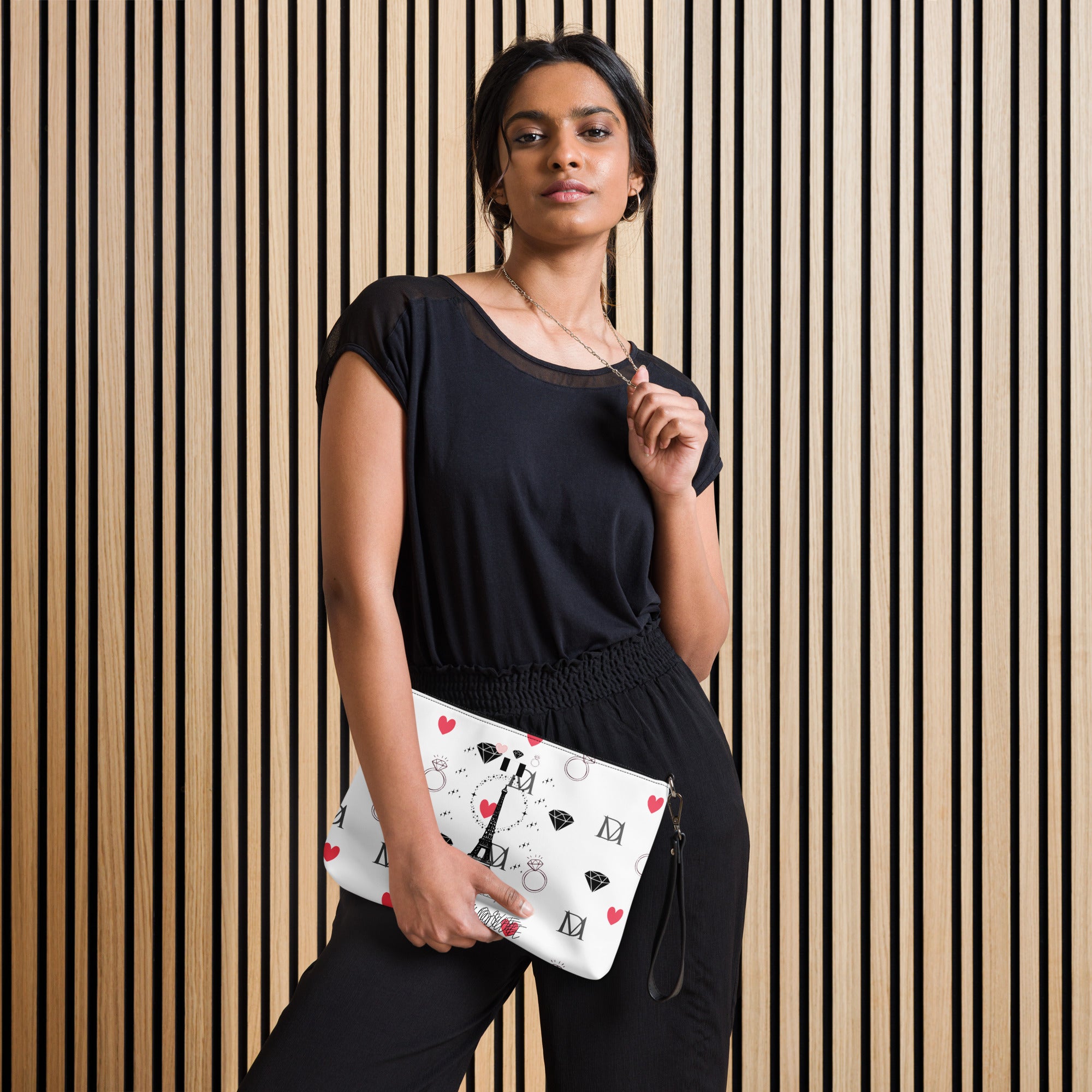 Black all-over-print Borsetta crossbody bag by Daemon Luxury featuring a Paris "More Love" motif and adjustable strap.