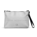 Black NARDO Scale all-over-print crossbody bag by Daemon Luxury with adjustable strap and stylish design.