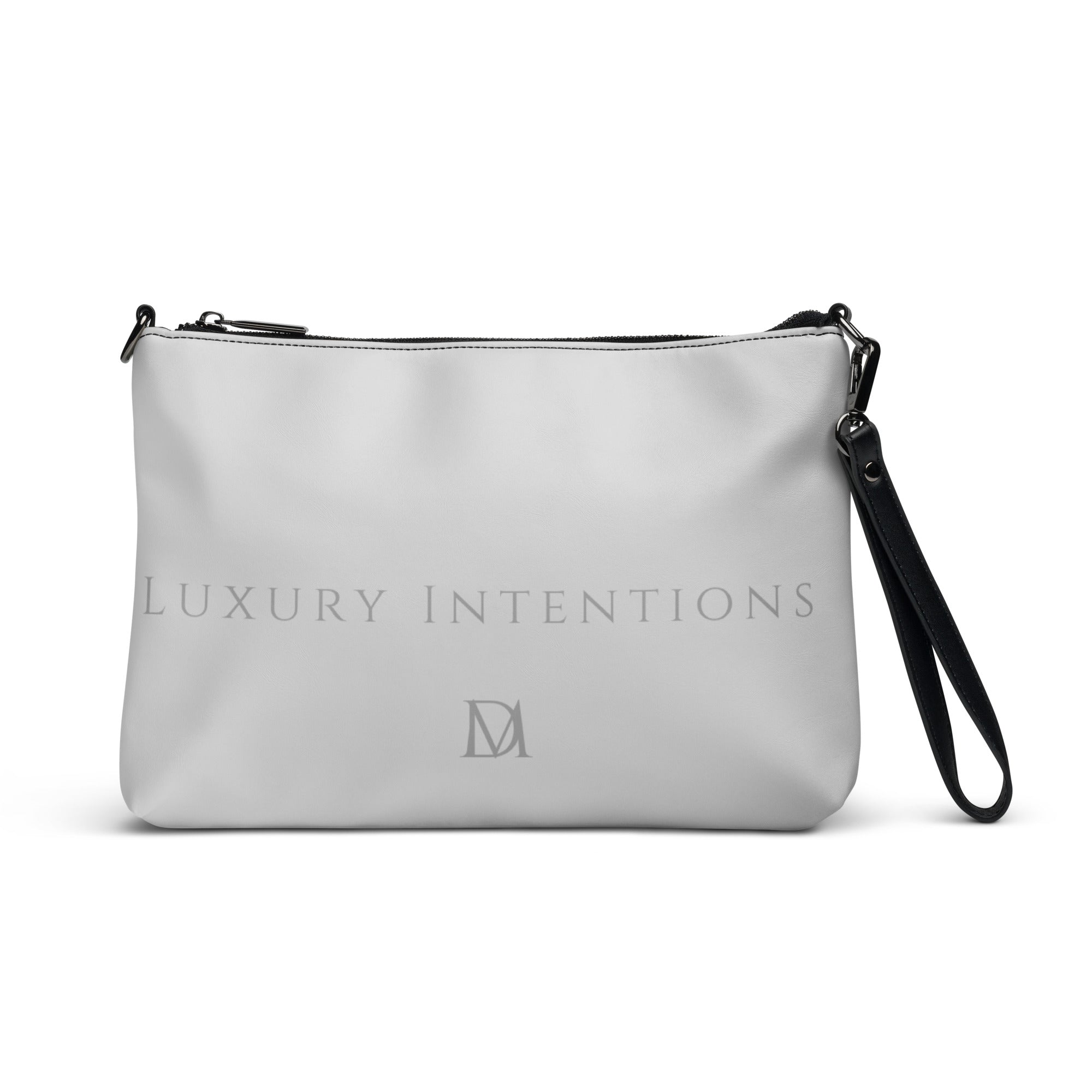 Black NARDO Scale all-over-print crossbody bag by Daemon Luxury with adjustable strap and stylish design.
