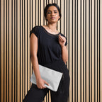 Black NARDO Scale all-over-print crossbody bag by Daemon Luxury with adjustable strap and bold sunless dream design.