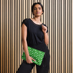 Black Borsetta crossbody bag featuring Belly Red’s Garden Enriched Bloom all-over print by Daemon Luxury.