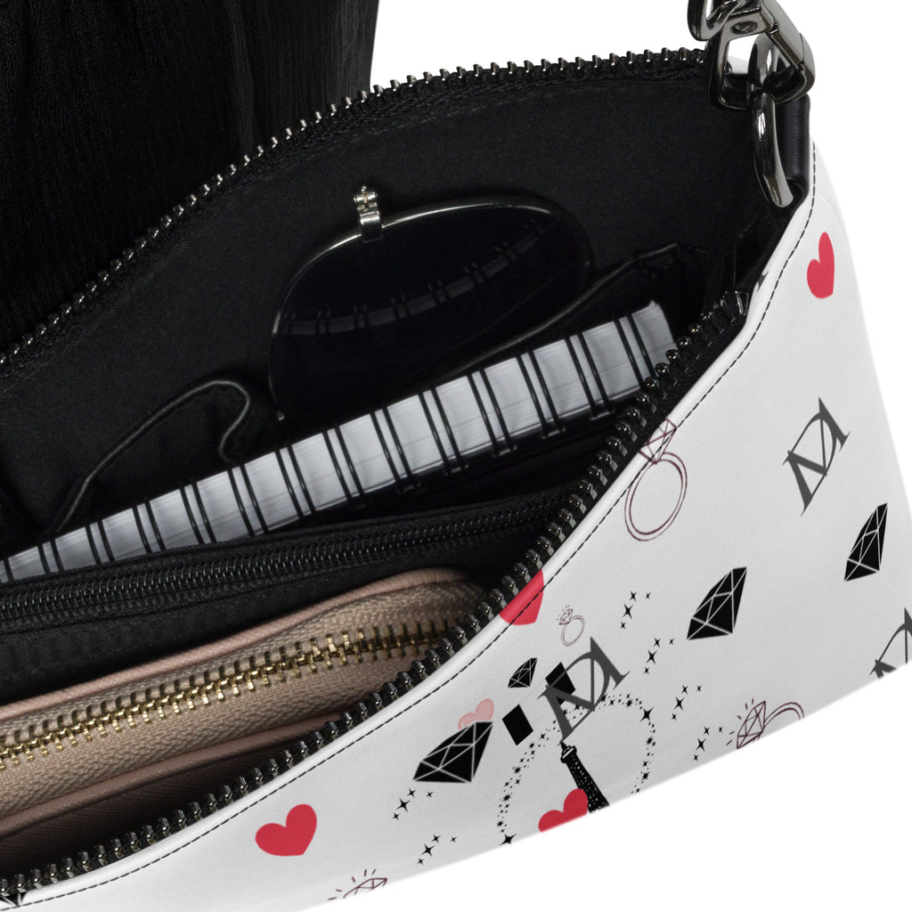 Daemon Luxury Metronome Paris crossbody bag with all-over black print and stylish design for versatile fashion.