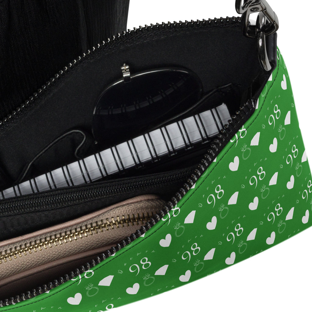 Daemon Luxury Belly Red’s Garden Borsetta crossbody bag featuring a black all-over-print design with floral details.