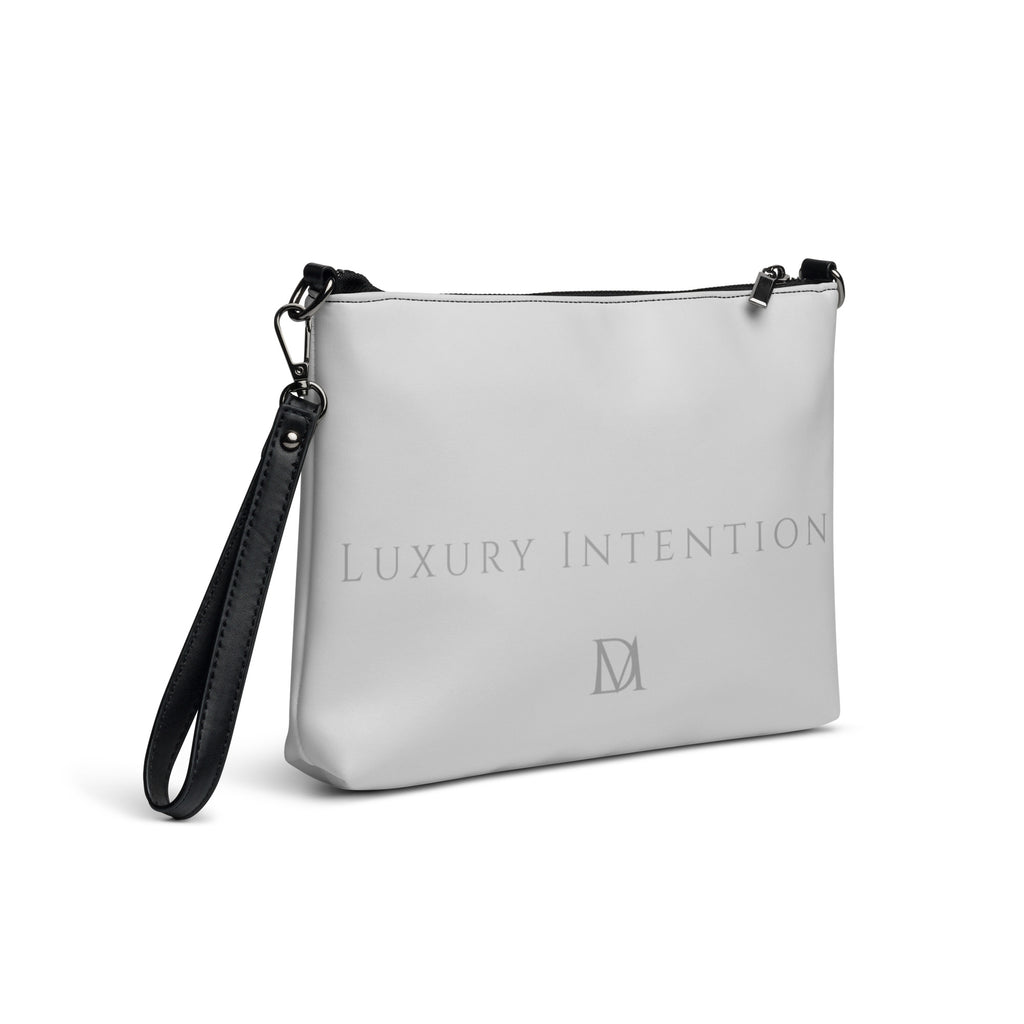 Black NARDO Scale Borsetta crossbody bag by Daemon Luxury with all-over print, shown from the right back side.