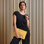 White crossbody bag with all-over frosted diamond pattern and Tarmin Honeybees design by Daemon Luxury.