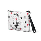 White Borsetta crossbody bag by Daemon Luxury featuring all-over-print design, shown from the left front view.
