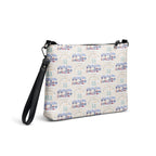 Honeybee Intel Forecast crossbody bag by Daemon Luxury with all-over white print, shown from the right back angle.