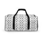 White Daemon Luxury Dim Diamonds Artica Nero duffle bag with all-over print and black accents, showcasing spacious design and durable fabric.