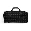 White Makara Coroner Borsone duffle bag with all-over print featuring bold Daemon branding and graphic design on the front.