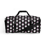 Frosted Hearts Nemesis Borsone duffle bag with all-over white print, by Daemon Luxury, showing front view with handles and design details.
