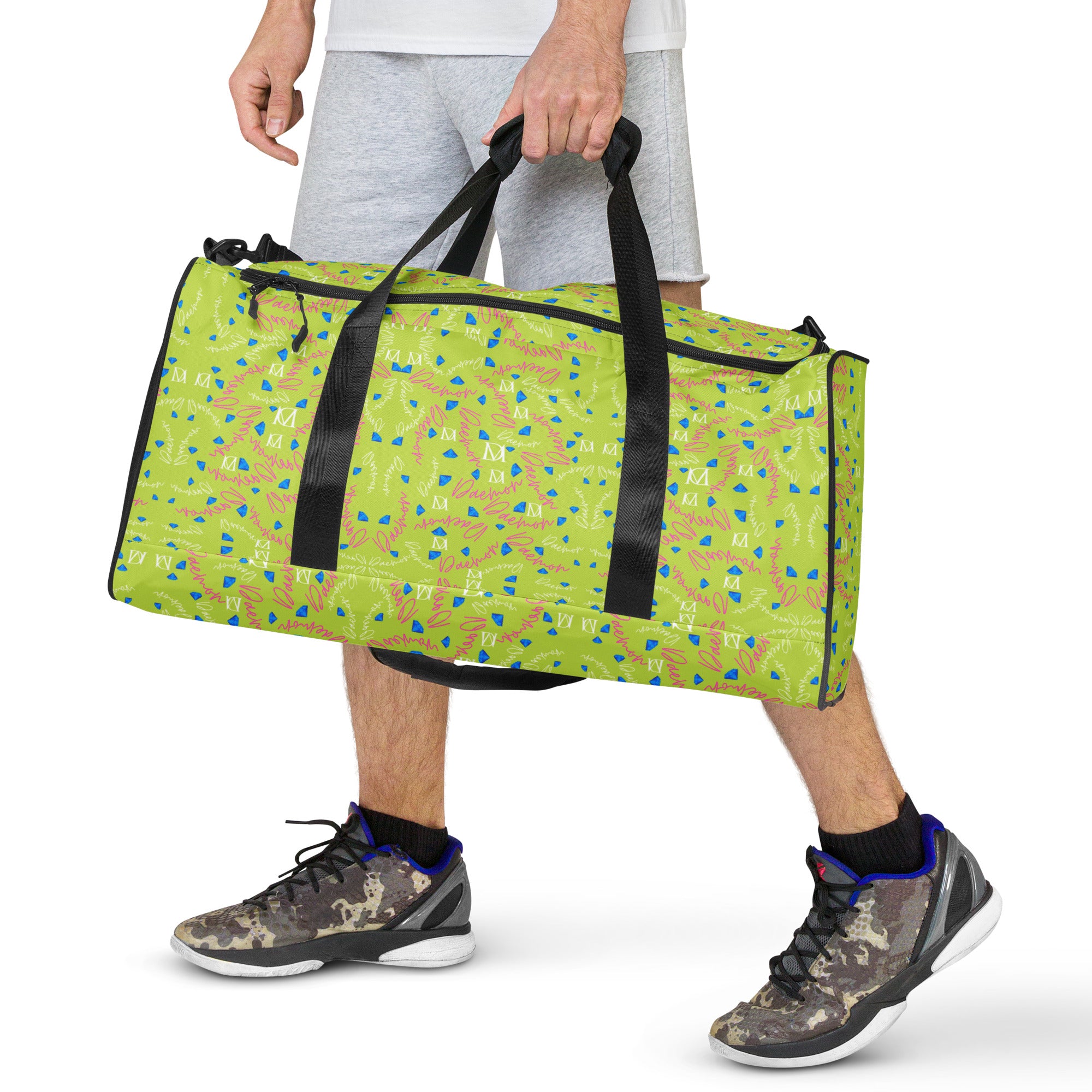 Daemon Luxury Picasso Mirrors Borsone duffle bag with all-over white print, showcasing its spacious design and stylish pattern.