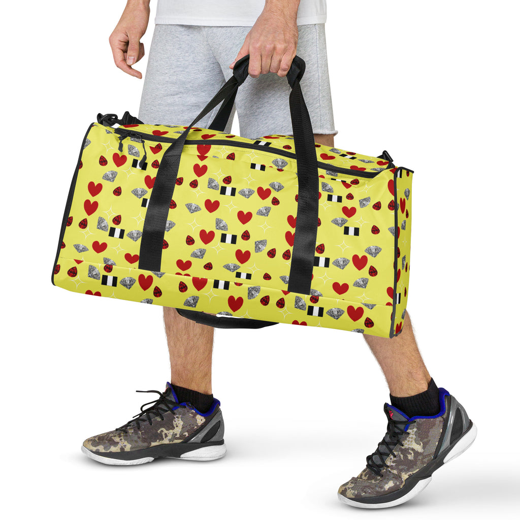 Daemon Luxury Foreigners Luv Solar Butter all-over print duffle bag in white with vibrant design, front view showing detailed pattern.