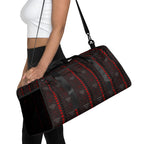 Daemon Luxury Supreme Models More Less Love all-over-print duffle bag in white, showcasing bold graphic design and spacious carry space.