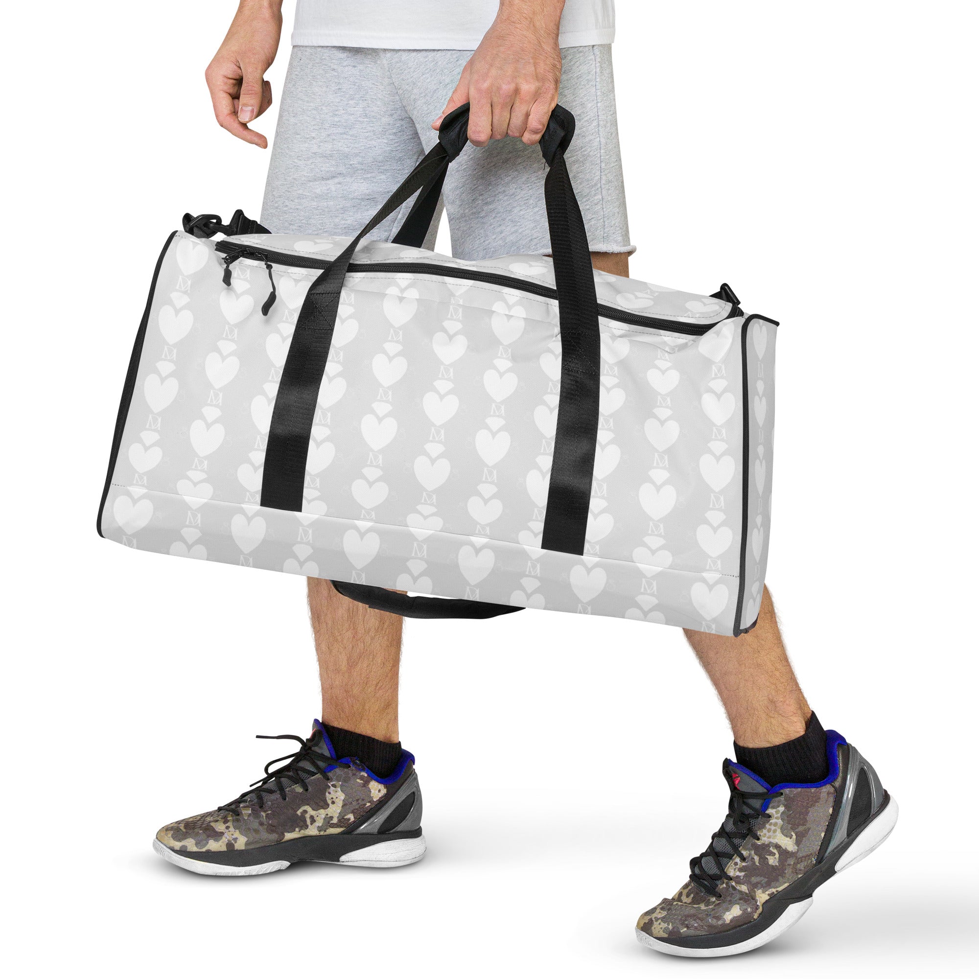 Frosted Heartfelt sunless tanning product from Daemon Luxury, with all-over white print duffle bag featuring a heart design.