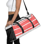 Daemon Luxury SACHI BANS Artica Blizzard all-over-print duffle bag in white, showcasing its spacious design and vibrant pattern.