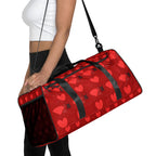 Daemon Luxury Supreme Models Foreigners Luv white all-over-print duffle bag with bold graphic design and sturdy handles.