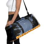 Daemon Luxury Crescent City Tarmin Honeybees all-over-print duffle bag in white with detailed bee and cityscape design.