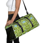 Daemon Luxury Belly Red’s Garden (Rebirth) Borsone duffle bag with all-over white print and colorful floral design.