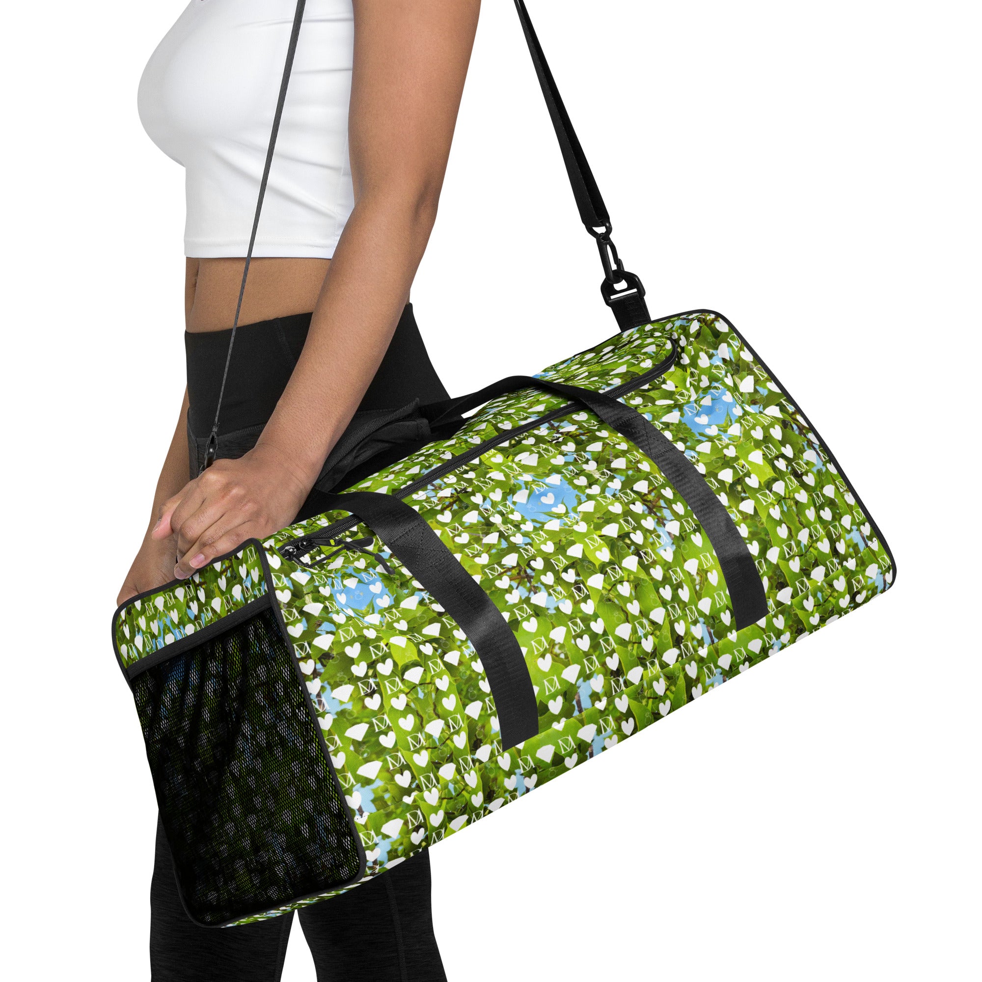 Daemon Luxury Belly Red’s Garden (Rebirth) Borsone duffle bag with all-over white print and colorful floral design.