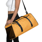 Daemon Luxury Makara Coroner all-over-print duffle bag featuring white fabric and detailed design, ideal for travel and storage.